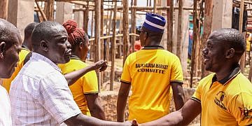 NRM youth leaders donate iron sheets to roof Luwero market