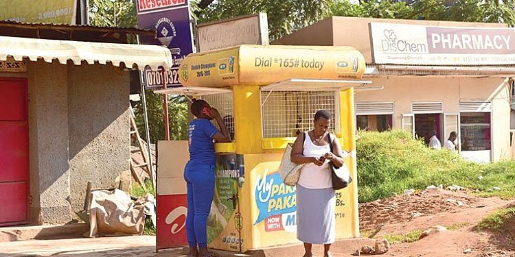BoU explains new rule for customers sending, withdrawing shs1m on mobile money to present national IDs