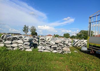 UPDF impound truck loaded with 146 bags of charcoal disguised as maize in Amuru