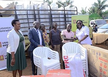 Uganda Breweries donates items worth shs30m to Luzira youth, women