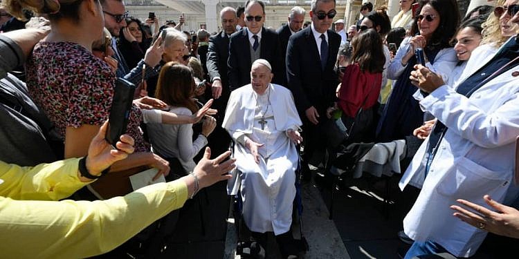 Pope Francis makes surprise public appearance after hospital discharge