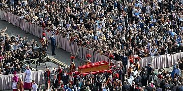 Mourners flood Vatican  as Pope Francis lies in open coffin