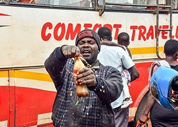 Coca Cola shares joy with travelers in Namayiba bus park