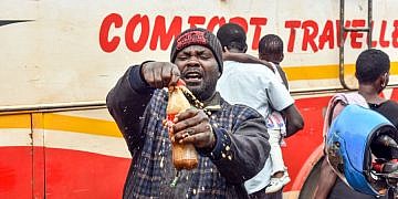 Coca Cola shares joy with travelers in Namayiba bus park