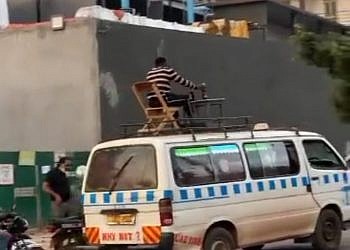 Police hunt for man seen drinking beer on top of moving taxi in TikTok stunt