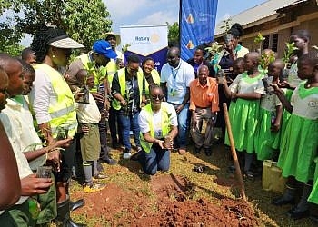 Rotary Club of Bulindo plants 1,000 trees at St. Kizito Primary School in Wakiso to curb climate change