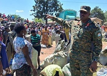 UPDF distributes impounded charcoal to Lira families