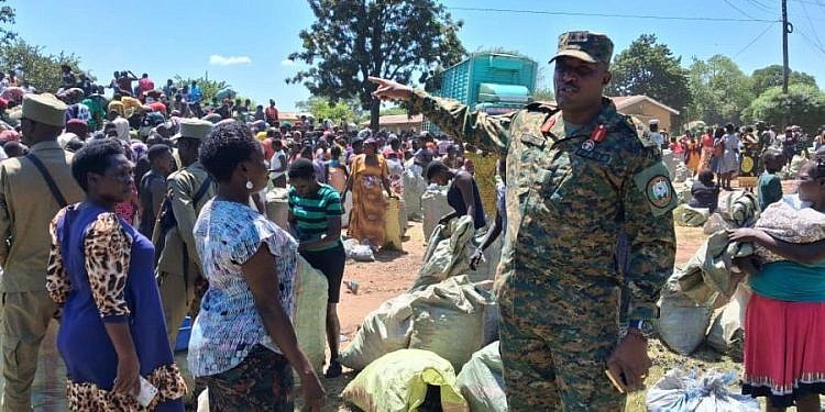 UPDF distributes impounded charcoal to Lira families