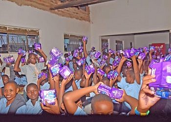 UBA Uganda donates books, sanitary pads to Mbale students