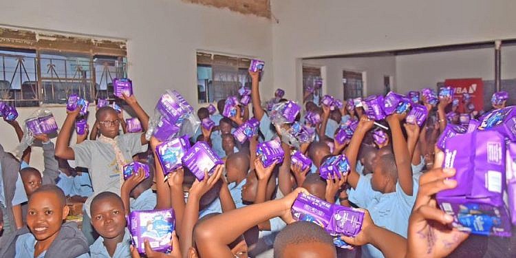 UBA Uganda donates books, sanitary pads to Mbale students