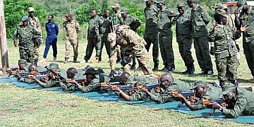 PICTURES: Museveni leads NRM MPs in shooting drills at Kyankwanzi