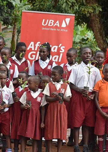 UBA UGnda plants trees to replenish environment  at Wakiso’s Namalere Primary School