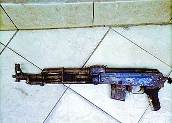 One arrested as police recover gun in Kyengera house
