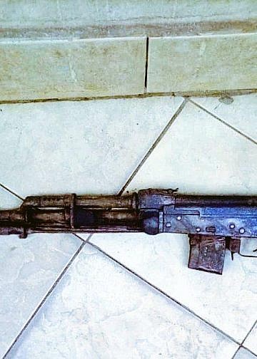 One arrested as police recover gun in Kyengera house