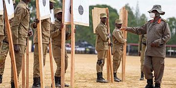 Museveni calls for tech-driven policing to combat crime as police passes out 10,000 officers
