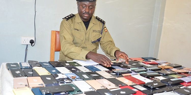 Police recover 300 stolen phones in raid at Cooper Complex in Kampala