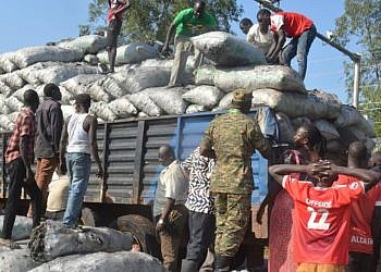 UPDF distributes 500 bags of seized charcoal to Gulu residents