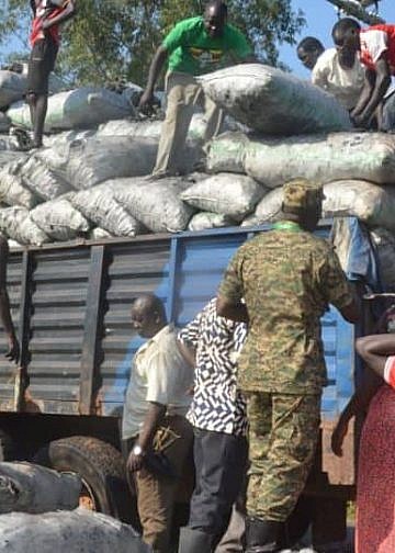 UPDF distributes 500 bags of seized charcoal to Gulu residents