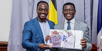 Museveni photographer Mwesigwa pays courtesy visit to Katikkiro Mayiga